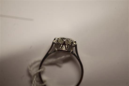 A modern platinum and solitaire diamond ring, size Q.